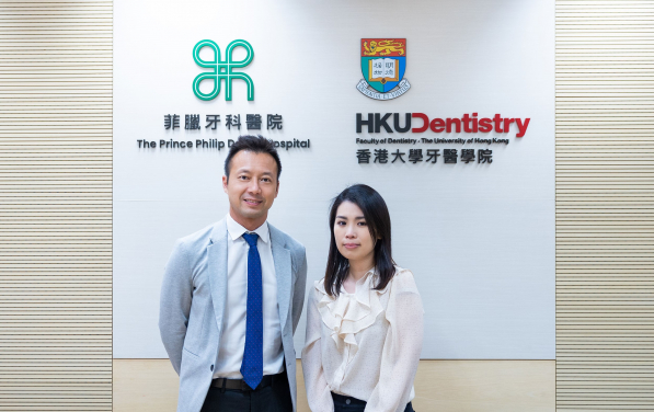 HKU Dentistry Oral and Maxillofacial Surgery research team: Dr Mike Leung (left) and Ms Natalie Wong compare the changes of patients’ quality of life (QoL) after receiving IVRO or SSRO as the treatment for mandibular prognathism.
 